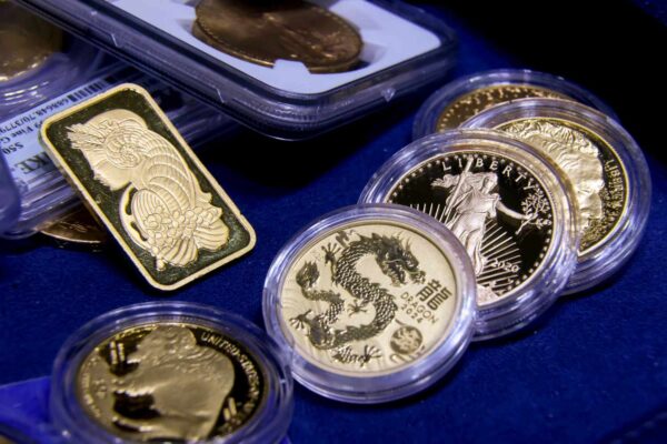 Why Wall Street Analysts Are Still Bullish on Gold Despite Recent Volatility