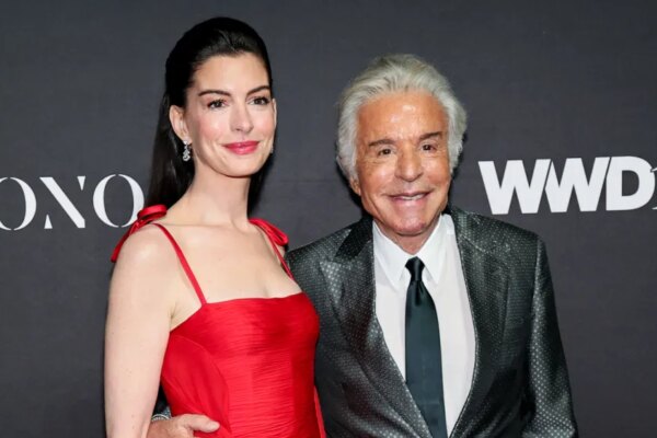 NEW YORK, NEW YORK - OCTOBER 28: (L-R) Anne Hathaway and Giancarlo Giammetti attend the 2025 WWD Honors at Cipriani South Street on October 28, 2025 in New York City. (Photo by Theo Wargo/Getty Images)