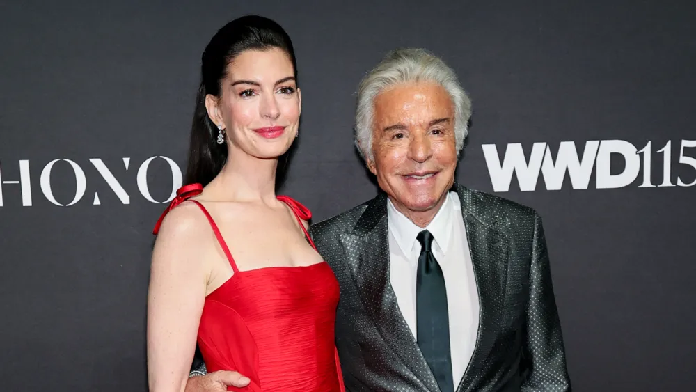 NEW YORK, NEW YORK - OCTOBER 28: (L-R) Anne Hathaway and Giancarlo Giammetti attend the 2025 WWD Honors at Cipriani South Street on October 28, 2025 in New York City. (Photo by Theo Wargo/Getty Images)