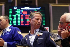 Trading Day: Stocks' momentum fades, gold plunges