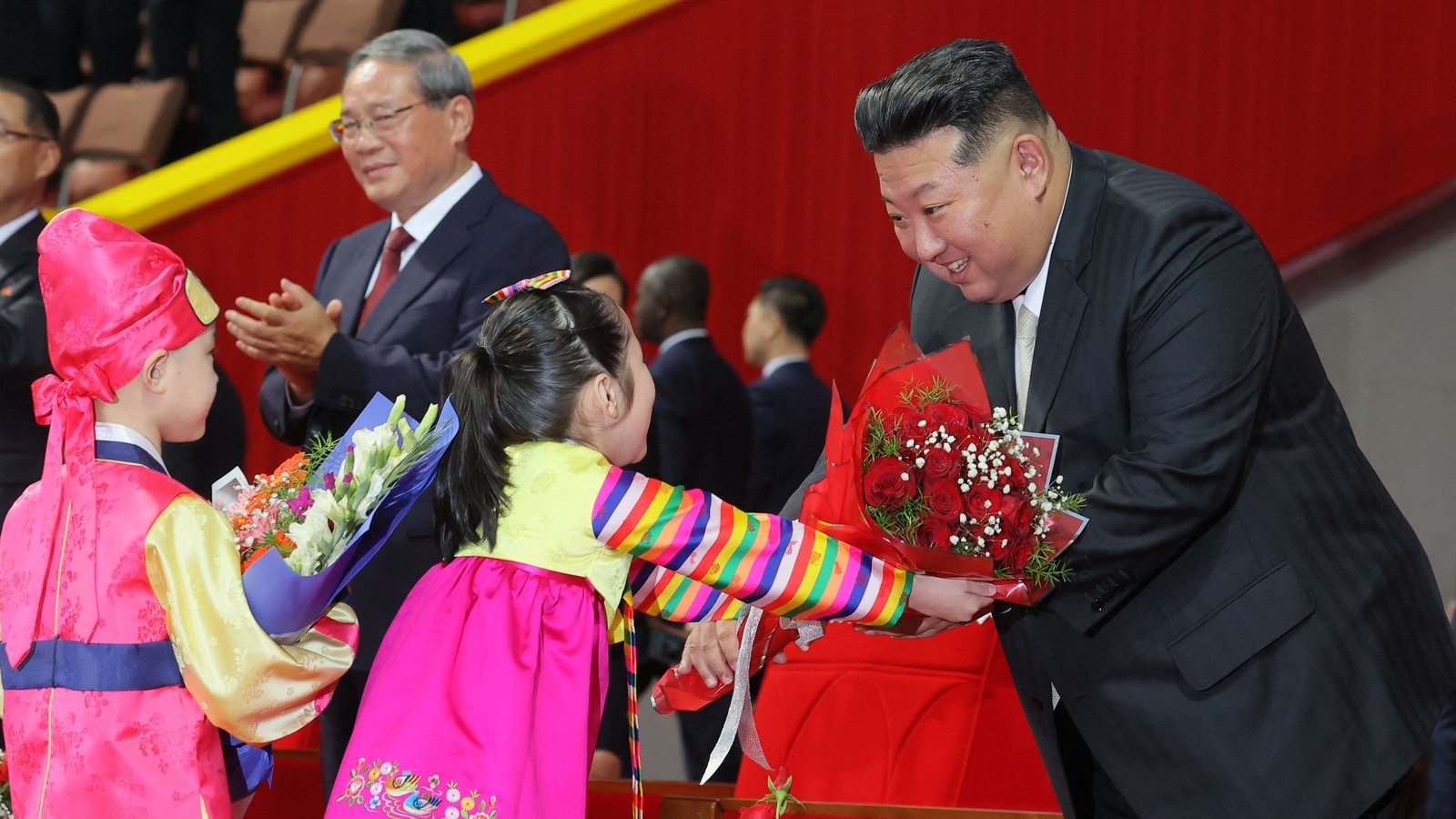 North Korea holds military parade, shows off new intercontinental missile