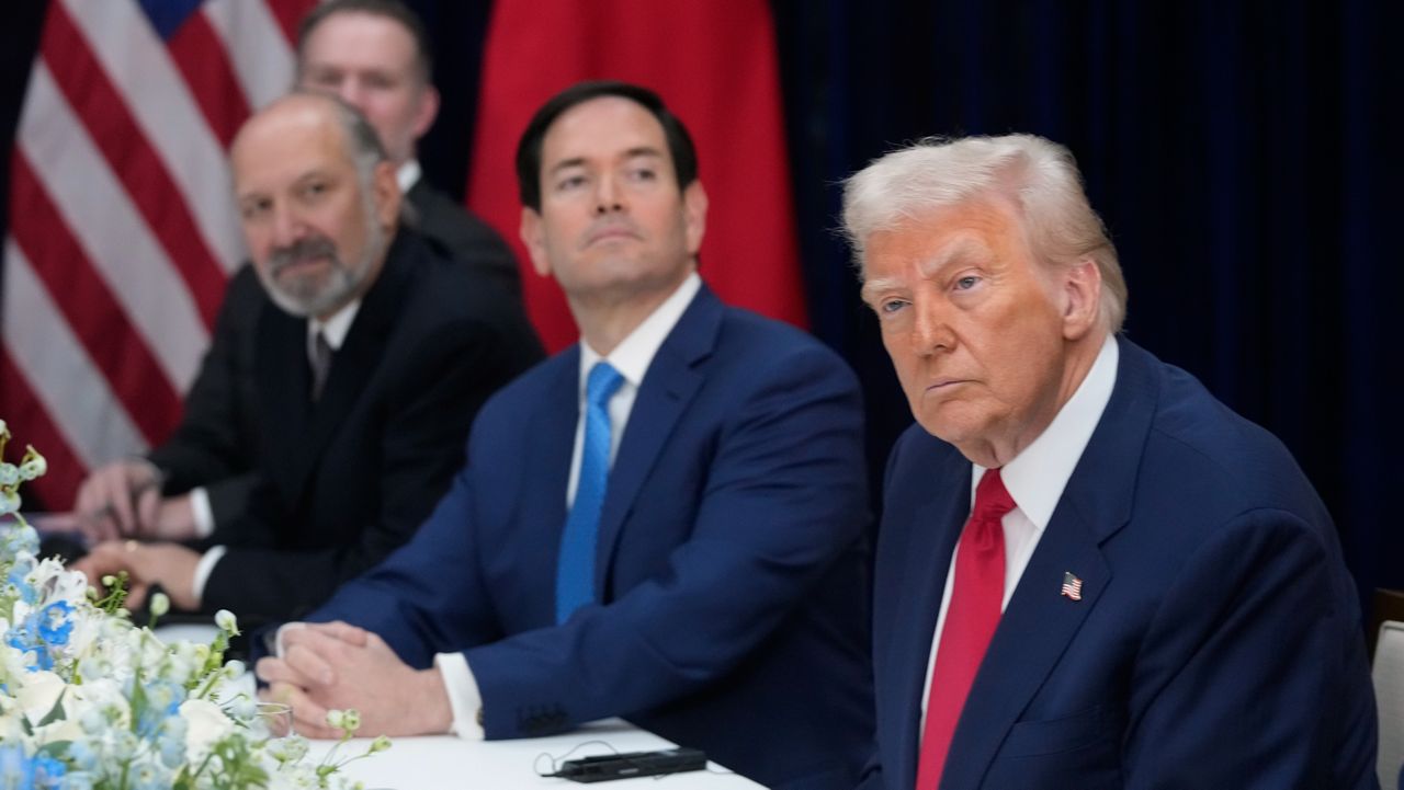President Donald Trump, right, with Secretary of State Marco Rubio, second right, and Commerce Secretary Howard Lutnick, third right, meets with Chinese President Xi Jinping at Gimhae International Airport in Busan, South Korea, Thursday, Oct. 30, 2025. (AP Photo/Mark Schiefelbein)
