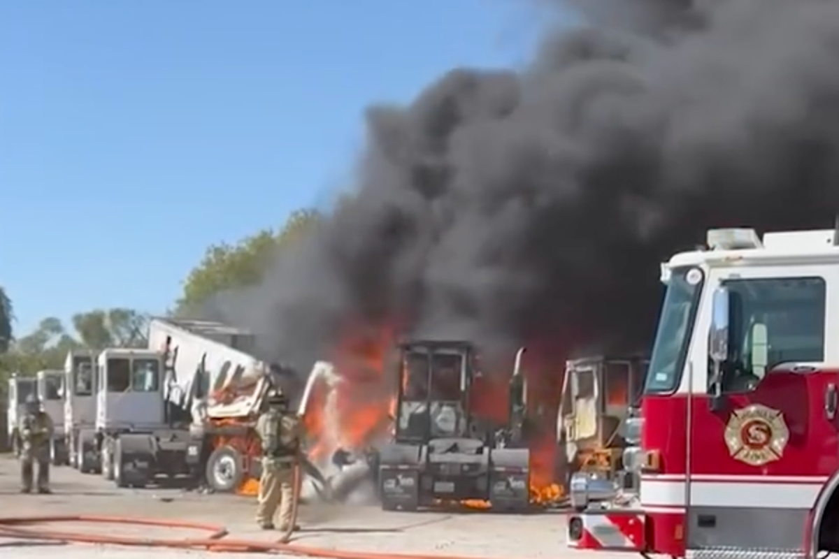 Plane crashes into trucks and trailers near Texas airport as emergency services respond and black smoke fills the air