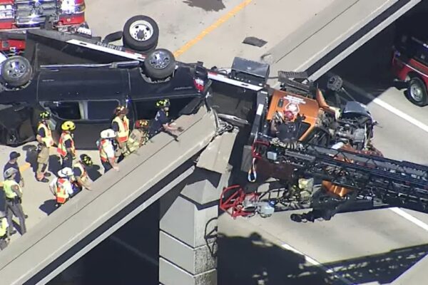 Semi-truck hanging off Highway 121, U.S. 75 in McKinney