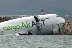 Two killed as cargo plane skids off runway into the sea in Hong Kong