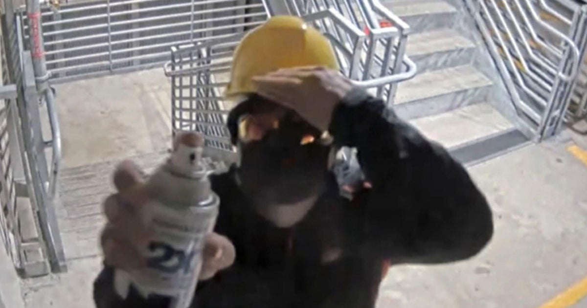 Security video helps lead Oregon detectives to a masked killer who tried to hide the crime