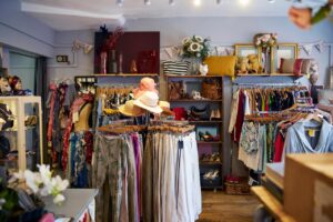 A thrift store offering pre-owned clothing and sustainable household goods. (Adobe Stock Photo)