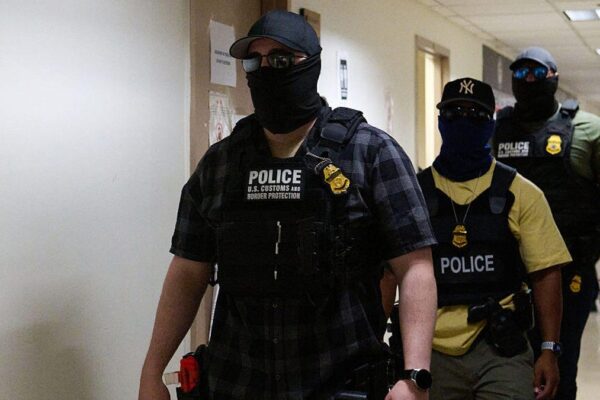 ICE agents detain immigrants seeking asylum in New York.