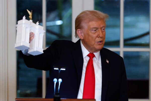 Trump unveils model of triumphal arch to business titans at White House ballroom fundraiser Trump unveils model of triumphal arch to business titans at White House ballroom fundraiser