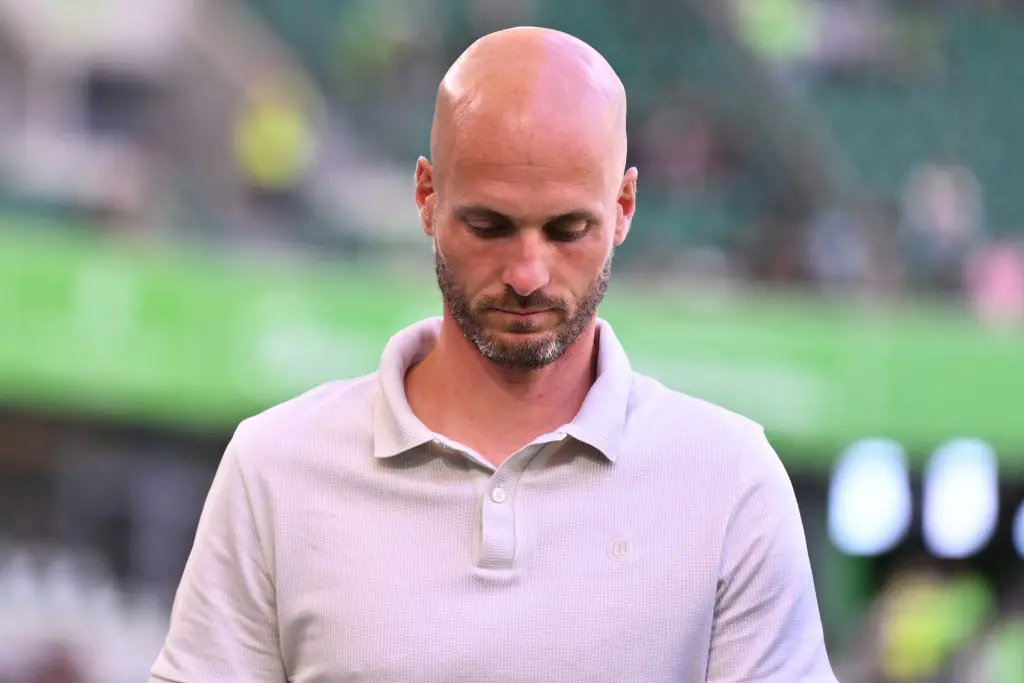 Paul Simonis takes heat in the German press as Peter Christiansen's 'Wolfsburg Project' once again stalls