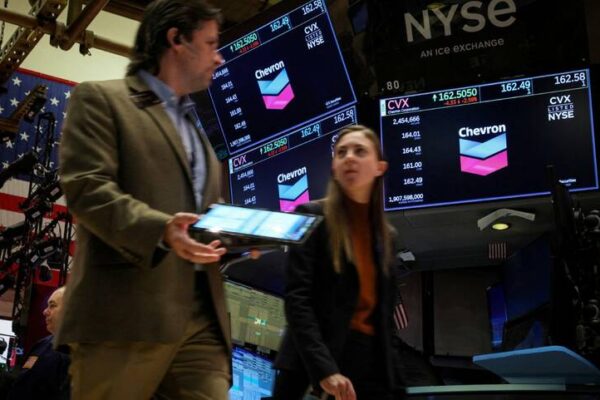 Dow, S&P 500 manage record closing highs; Nasdaq falls