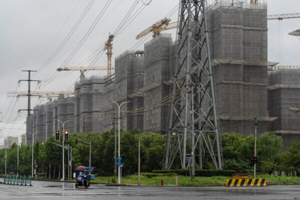 PE Firm Gaw’s Last-Minute Loan Talks Flag China Property Strains