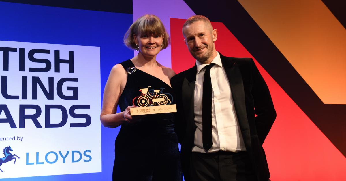 Cycling volunteer overwhelmed with emotion after being honoured