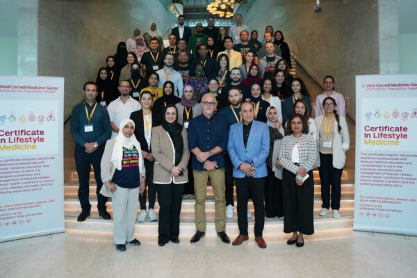 Dr. Ravinder Mamtani (second right front row), Dr. Sohaila Cheema (second left front row), with other speakers and programme participants.