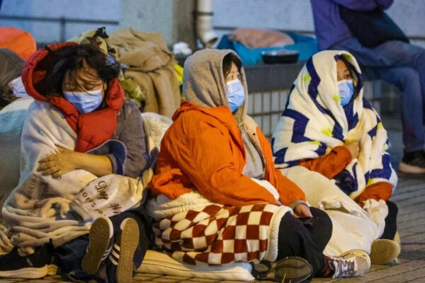‘Tired and anxious’: displaced Hong Kong fire survivors facing sleepless nights