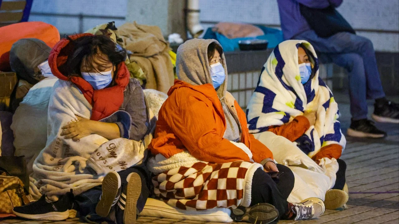 ‘Tired and anxious’: displaced Hong Kong fire survivors facing sleepless nights