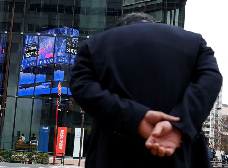 Stocks drop, as investors fret over tech valuations; gold rallies