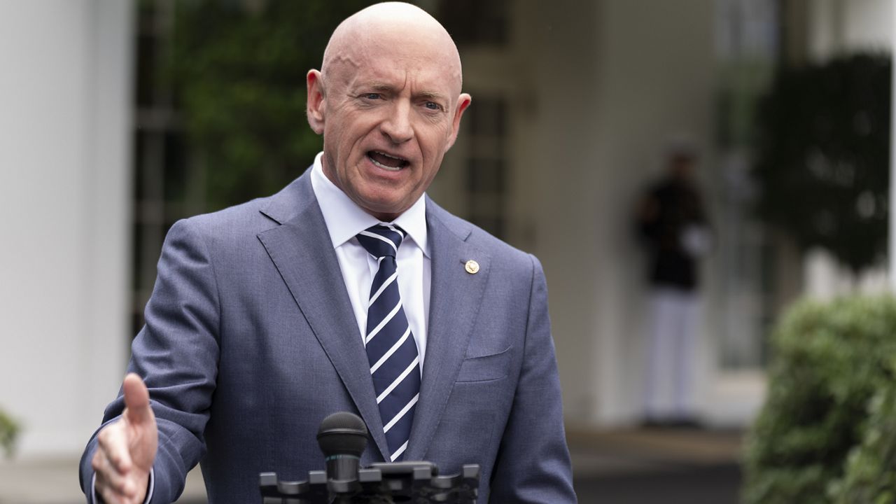 Sen. Mark Kelly, D-Ariz., speaks about the southern border outside the West Wing of the White House, Tuesday, June 4, 2024, in Washington. (AP Photo/Manuel Balce Ceneta, file)