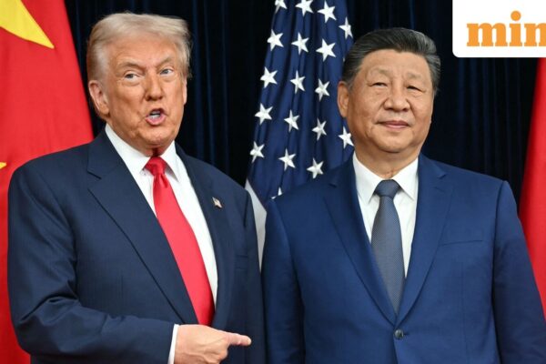 US President Donald Trump (L) and China's President Xi Jinping greet each other. File photo