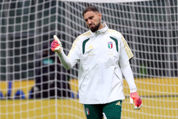 MILAN, ITALY - NOVEMBER 16: Gianluigi Donnarumma of Italy warms up prior to the FIFA World Cup 2026 qualifier match between Italy and Norway at San Siro Stadium on November 16, 2025 in Milan, Italy. (Photo by Marco Luzzani/Getty Images)