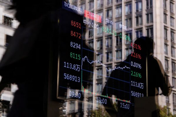 Asian markets advance as US shutdown set to end