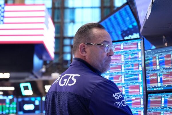 Dow soars more than 550 points as Wall Street embraces optimism that government might reopen soon