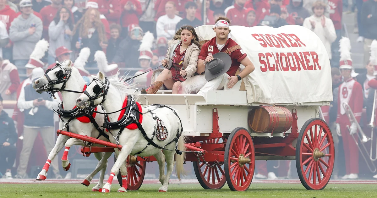 First Native woman drives Oklahoma's iconic Sooner Schooner, a covered wagon mascot
