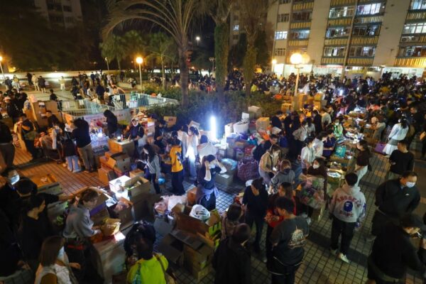 ‘We are with you in hour of need’: volunteers rally to help Hong Kong fire displaced