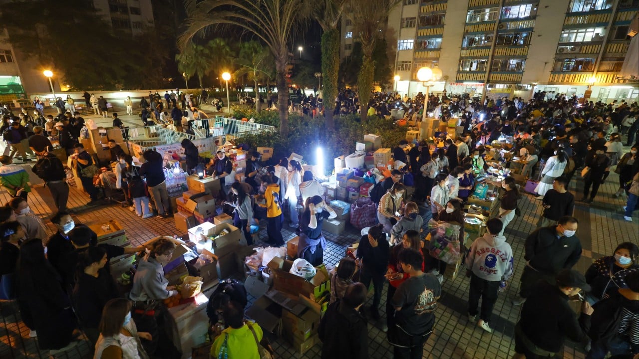 ‘We are with you in hour of need’: volunteers rally to help Hong Kong fire displaced