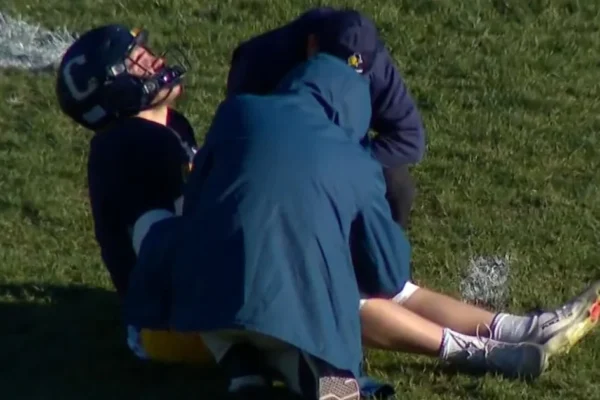 Injured quarterback finishes final college football game after cancer diagnosis