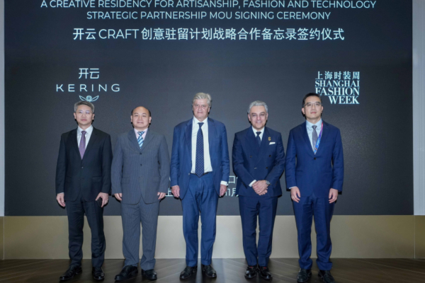 From left to right, Li Guoqing, deputy director of China International Import Expo Bureau; Liu Wei, Level-II inspector of Shanghai Municipal Commission of Commerce; Nicolas Forissier, French Minister Delegate for Foreign Trade and Economic Attractiveness; Luca de Meo, chief executive officer, Kering; Ji Shengjun, director of the Shanghai Fashion Week organizing committee