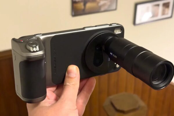 Image of a phone with a lens attached