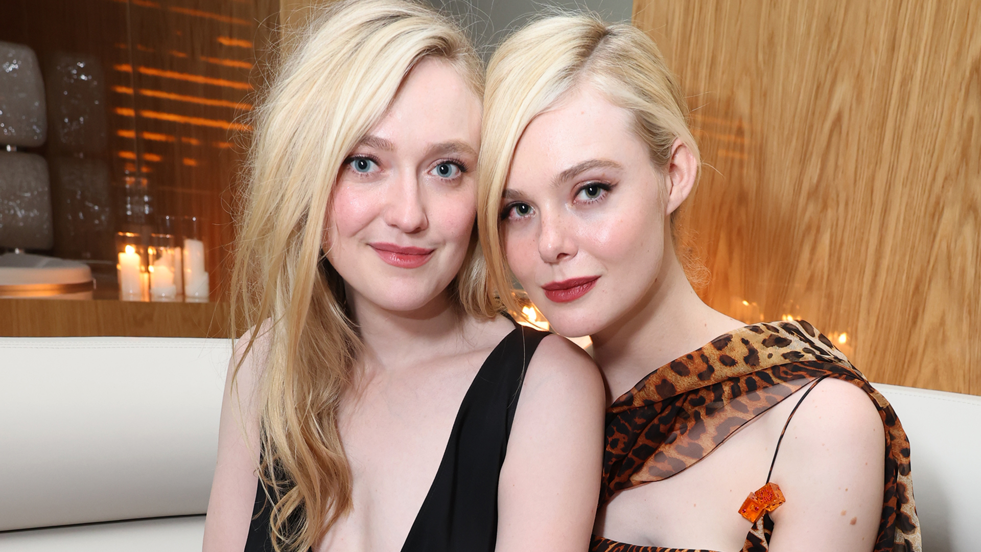 Elle and Dakota Fanning got "arrested" during Sabrina Carpenter's Short n' Sweet concert wearing pastel slip dresses
