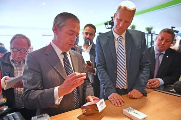 Nigel Farage, front left, and Nathan Gill, front right