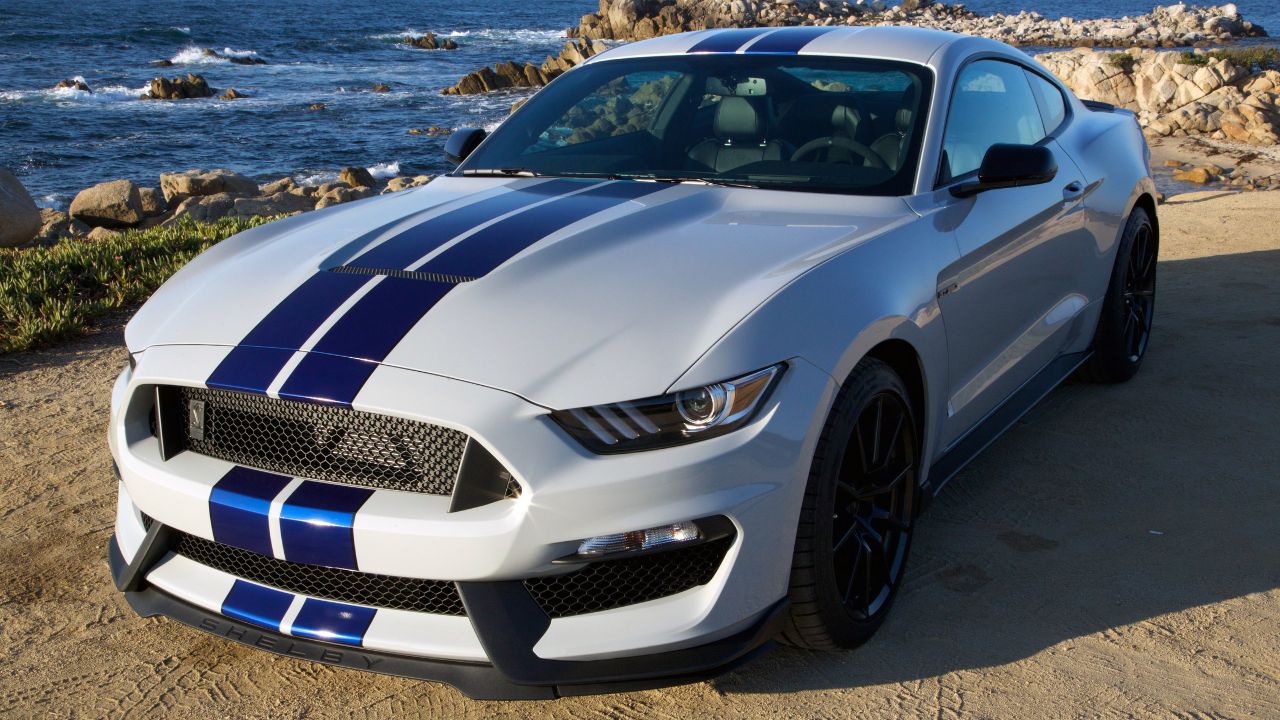 White 2016 Ford Mustang Shelby GT350 With Blue Stripes Parked Front 3/4 View