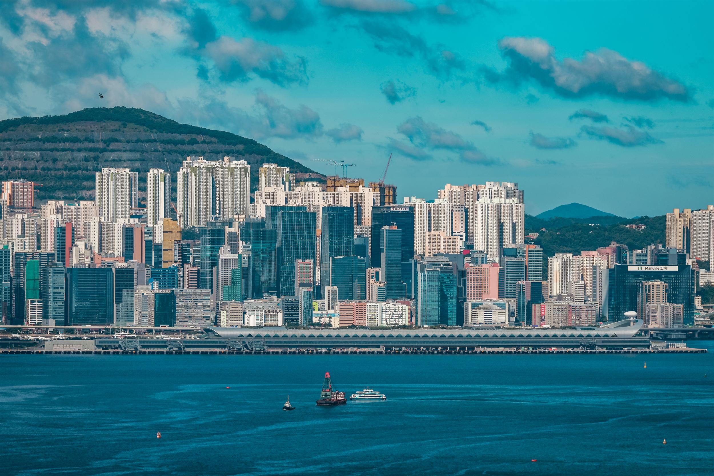 Mainland firms' global push set to accelerate through Hong Kong, experts say