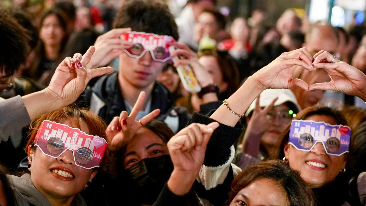 New Year’s Eve revellers hope for peace as crowds flock to Hong Kong lights show