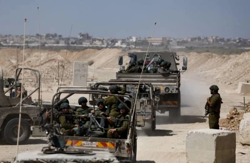 Israeli soldiers enter Gaza at the border as seen from Israel, October 3, 2025 (credit: REUTERS/AMIR COHEN)