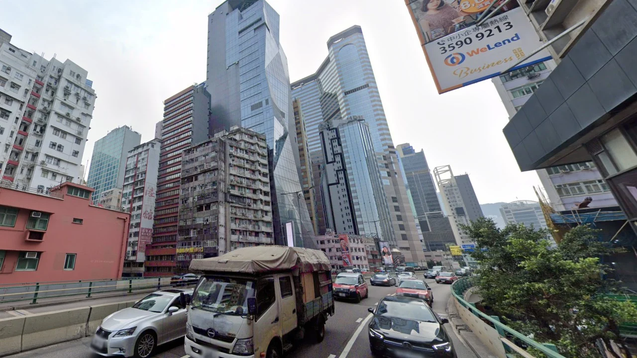 Hong Kong auxiliary policeman charged over alleged indecent act while driving taxi