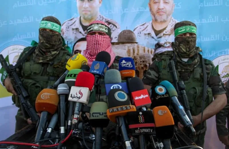 Abu Obeida speaks during an anti-Israel military parade, in Rafah, southern Gaza Strip, August 21, 2016 (credit: ABED RAHIM KHATIB/FLASH90)