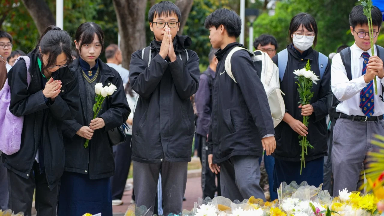 Students, workers and domestic helpers hit by Hong Kong fire get HK$20,000 payout