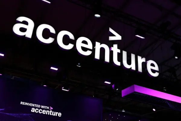Accenture logo in white against dark ceiling