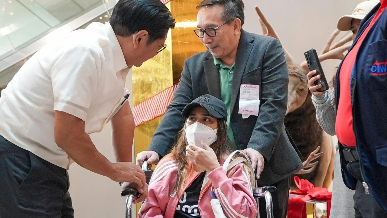 Philippines’ Marcos lauds helper returning home after deadly Hong Kong fire