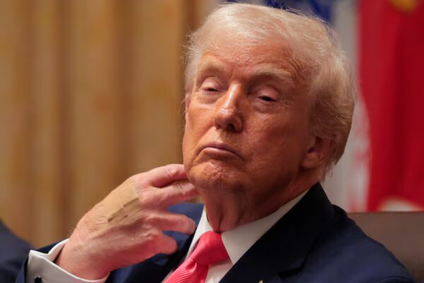 WASHINGTON, DC - DECEMBER 02: U.S. President Donald Trump looks on during a meeting of his Cabinet in the Cabinet Room of the White House on December 02, 2025 in Washington, DC. A bipartisan Congressional investigation has begun regarding Secretary of War Pete Hegseth's role in ordering U.S. military strikes on small boats in the waters off Venezuela that have killed scores of people, which Hegseth said are intended "to stop lethal drugs, destroy narco-boats and kill the narco-terrorists who are poisoning the American people.” (Photo by Chip Somodevilla/Getty Images)