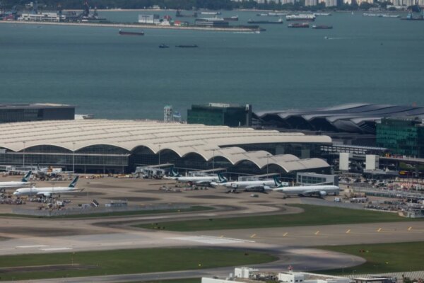 6 injured after vehicle swerves to avoid detached container at Hong Kong airport
