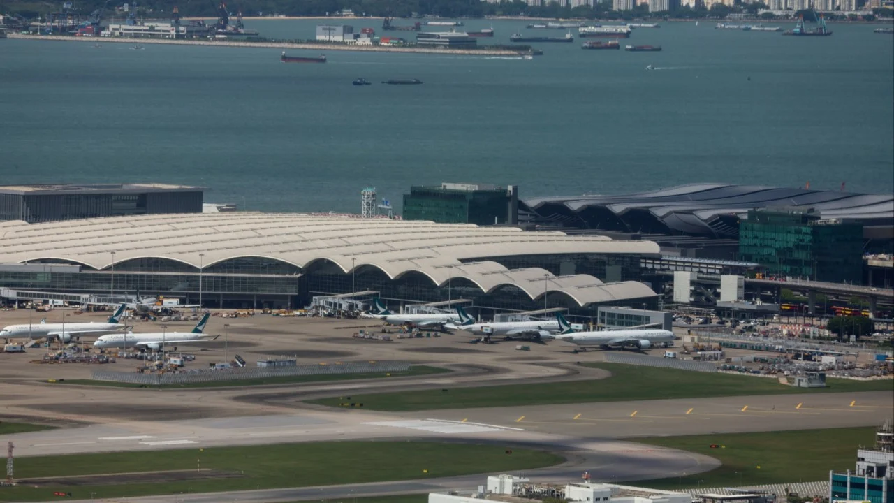 6 injured after vehicle swerves to avoid detached container at Hong Kong airport