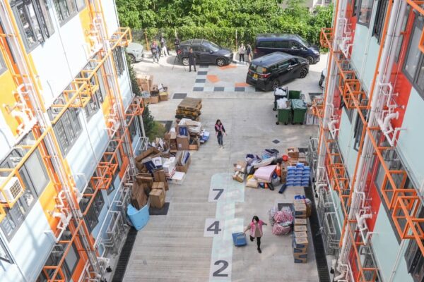 2,100 residents left homeless by Hong Kong fire stay in temporary housing, hotels