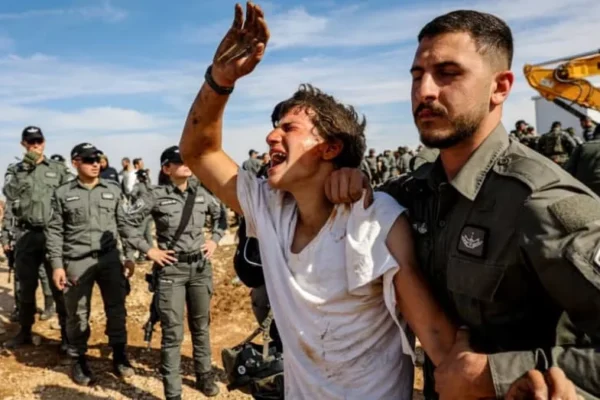 Israeli security forces clash with Jewish settlers during the evacuation of Illegal structures in Tzur Misgavi, an outpost in Gush Etzion, in the West Bank, November 17, 2025 (credit: REUTERS/NAAMA STERN)