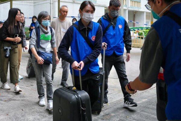 ‘Let me stay’: residents of block unscathed by Hong Kong fire hope to return