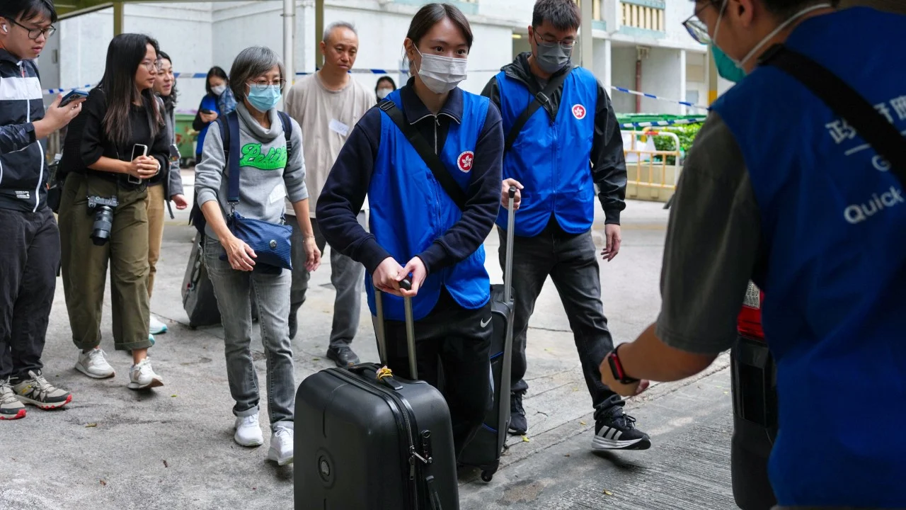 ‘Let me stay’: residents of block unscathed by Hong Kong fire hope to return